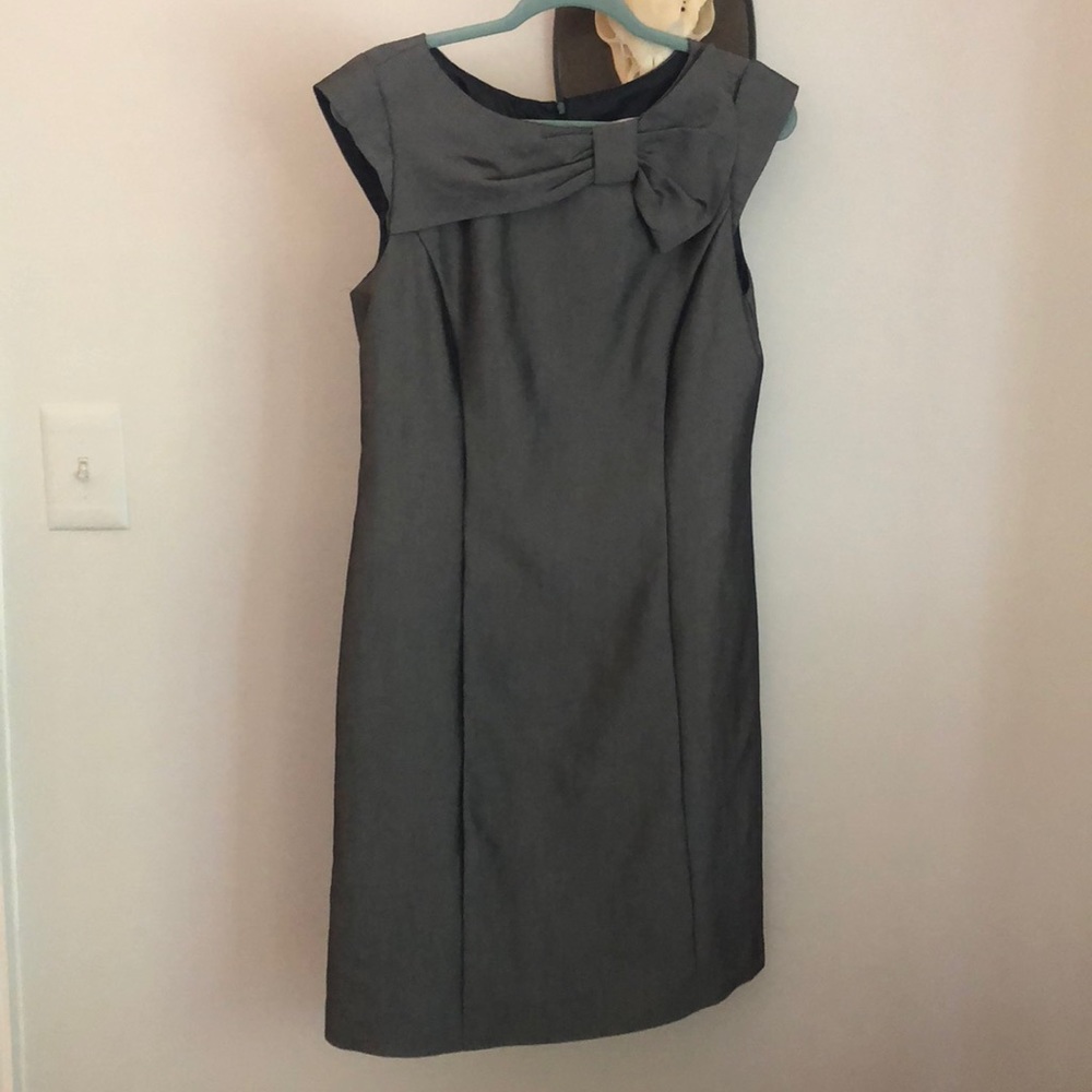 Gray sheath dress, half bow style top. Cap sleeve